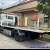 Isuzu NPR 400 kéo chở xe ô tô
